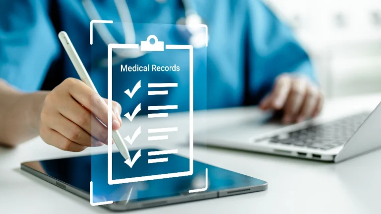 Healthcare professional using stylus on tablet with digital medical records interface.